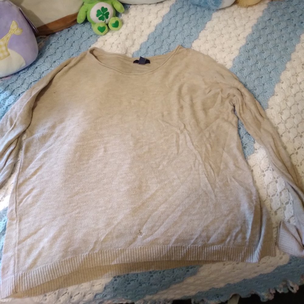 Cream sweater looks vintage